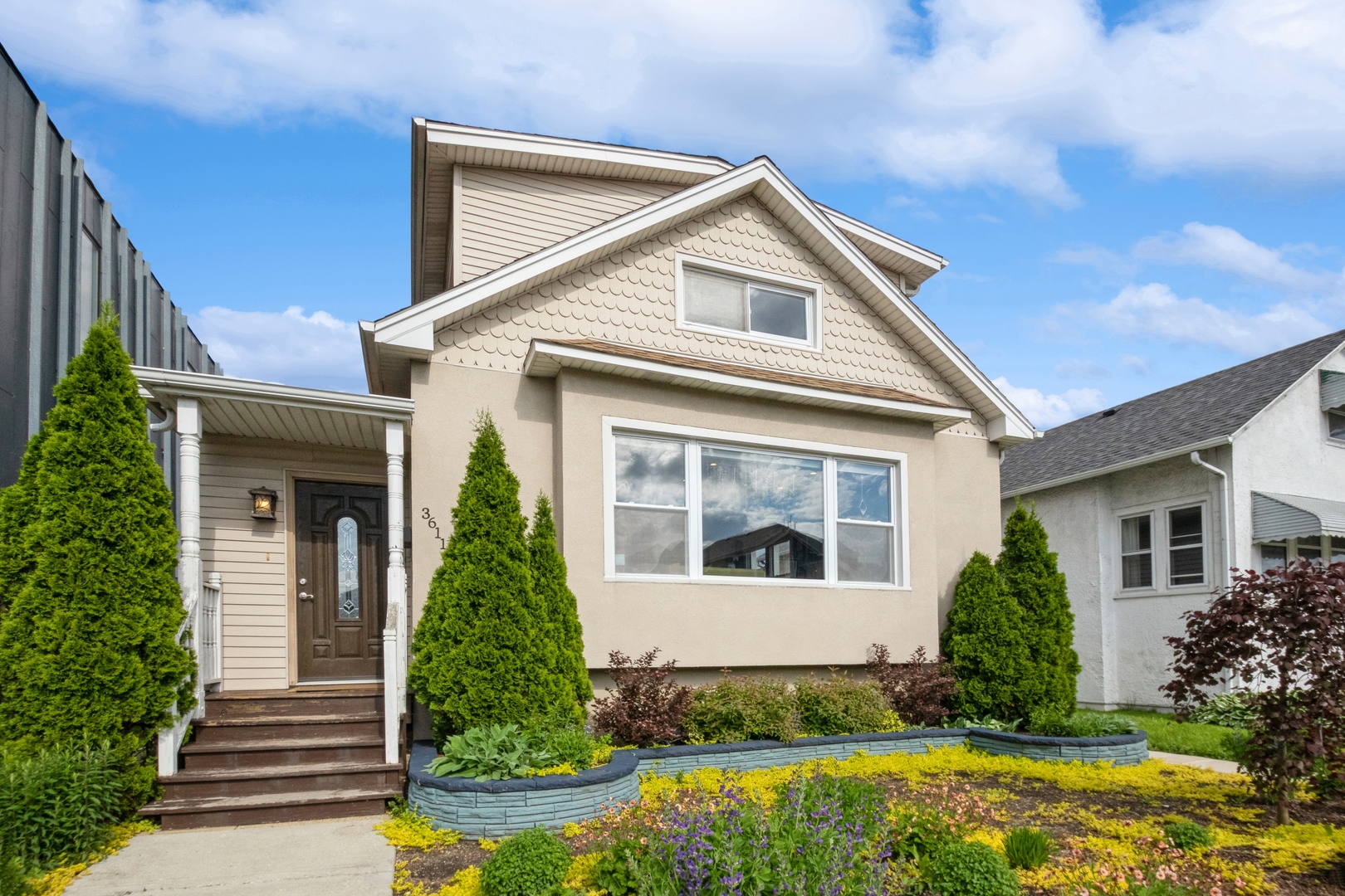 a front view of a house with a yard