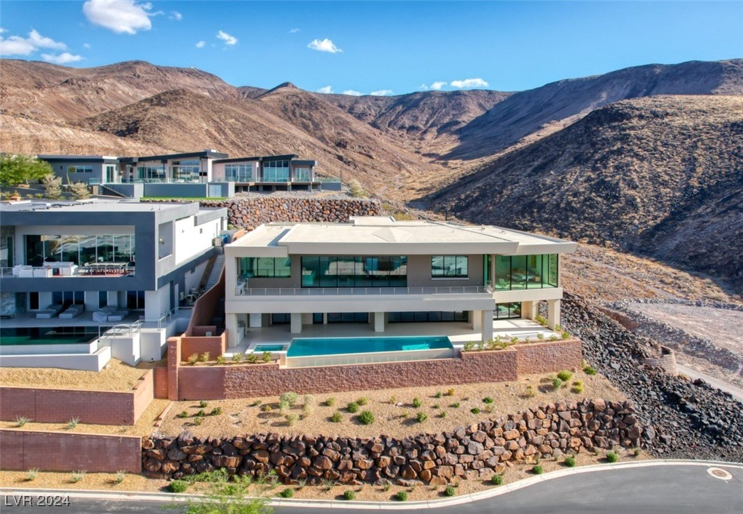 Stunning, elevated home located in guard-gated Mac