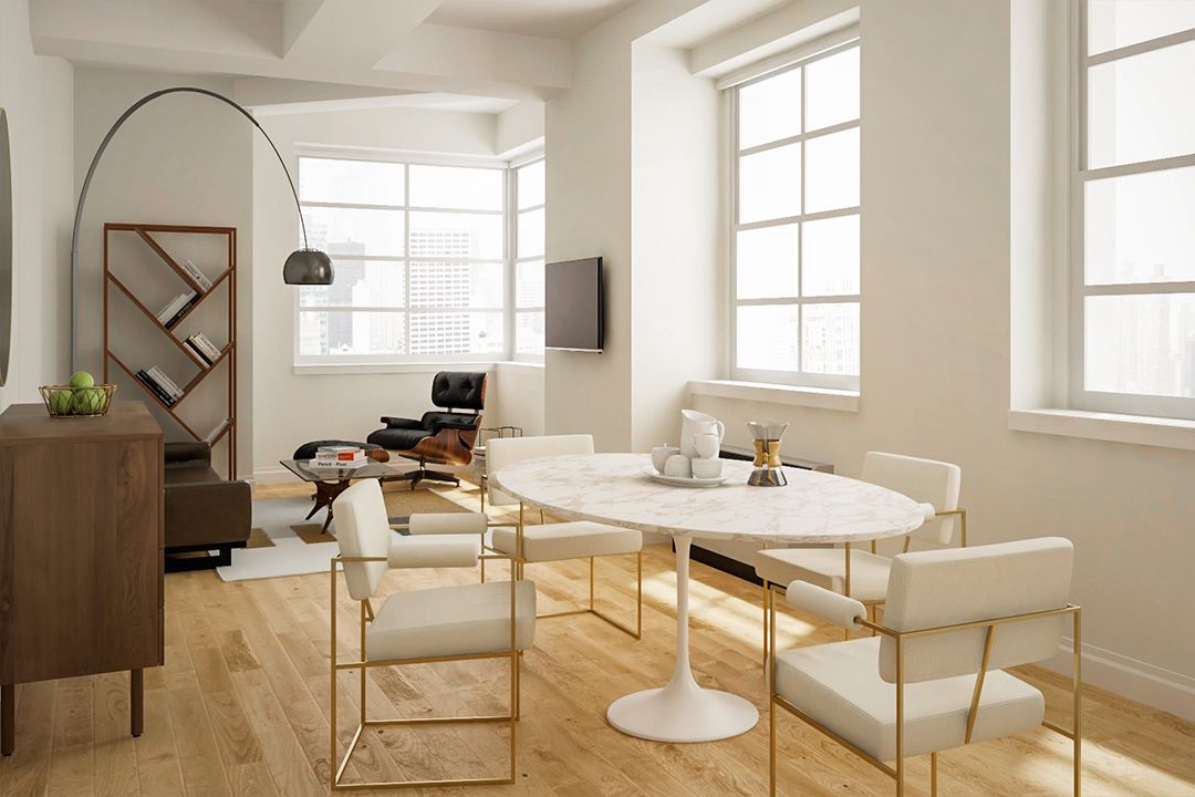 a view of a dining room with furniture and a window