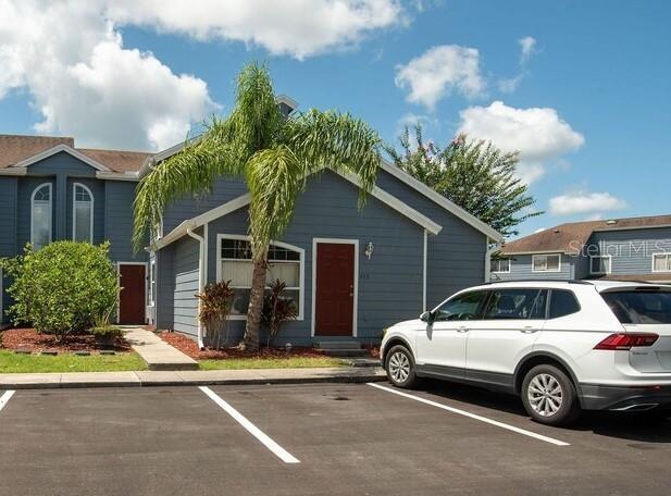 a front view of a house with parking