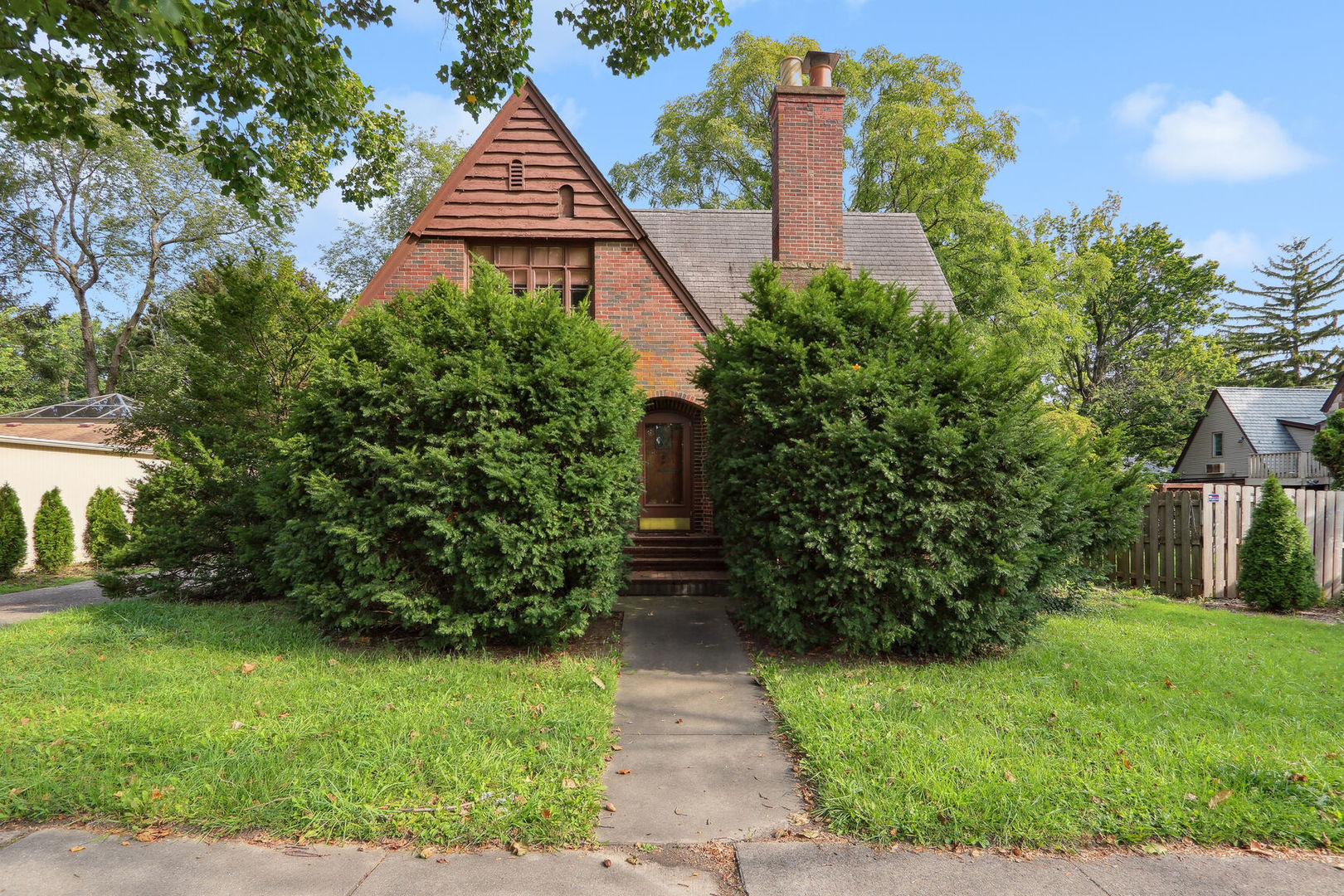 a view of house with yard