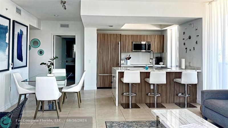 a view of kitchen with breakfast area