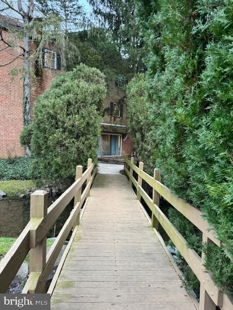 a view of balcony and yard