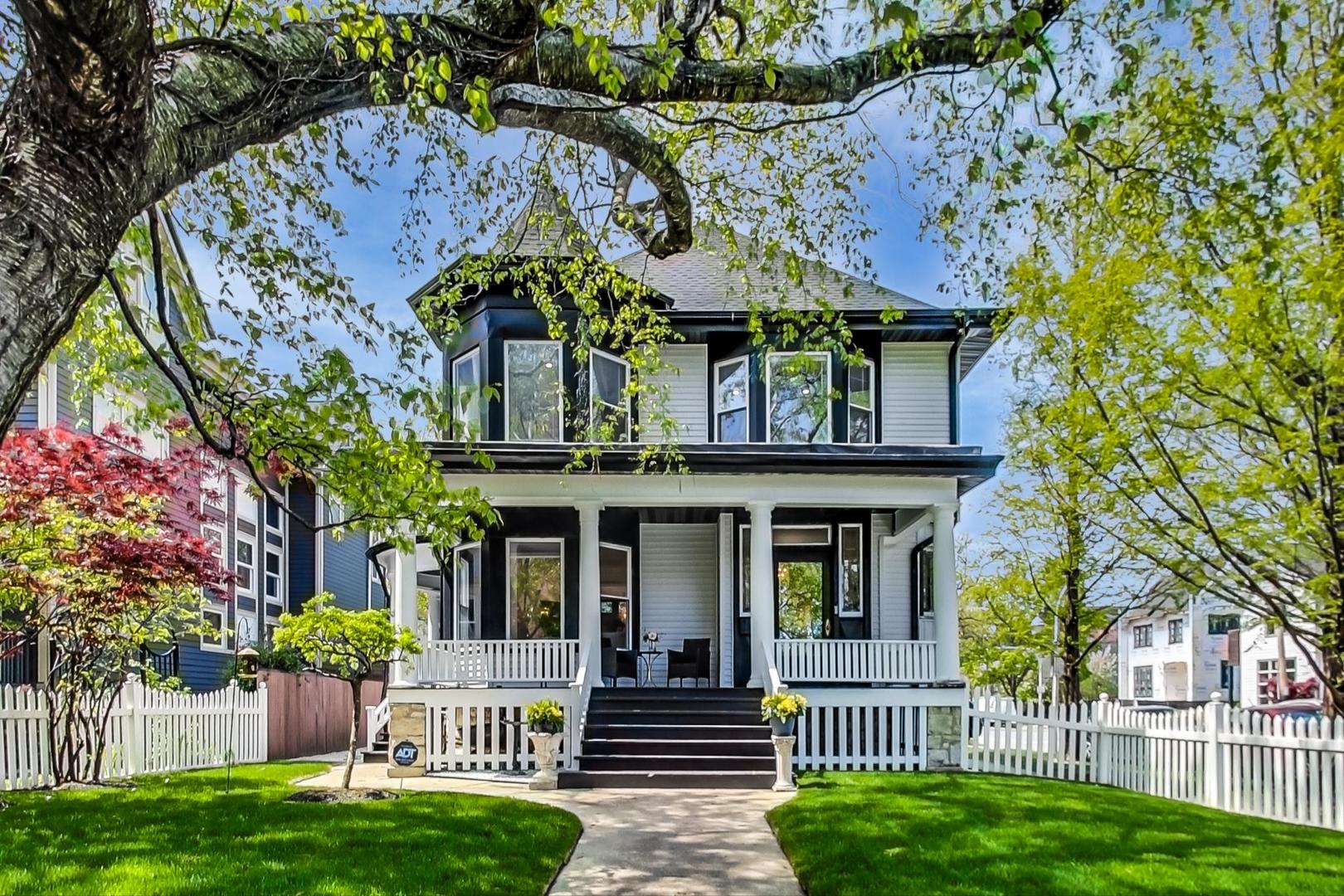 front view of a house with a garden