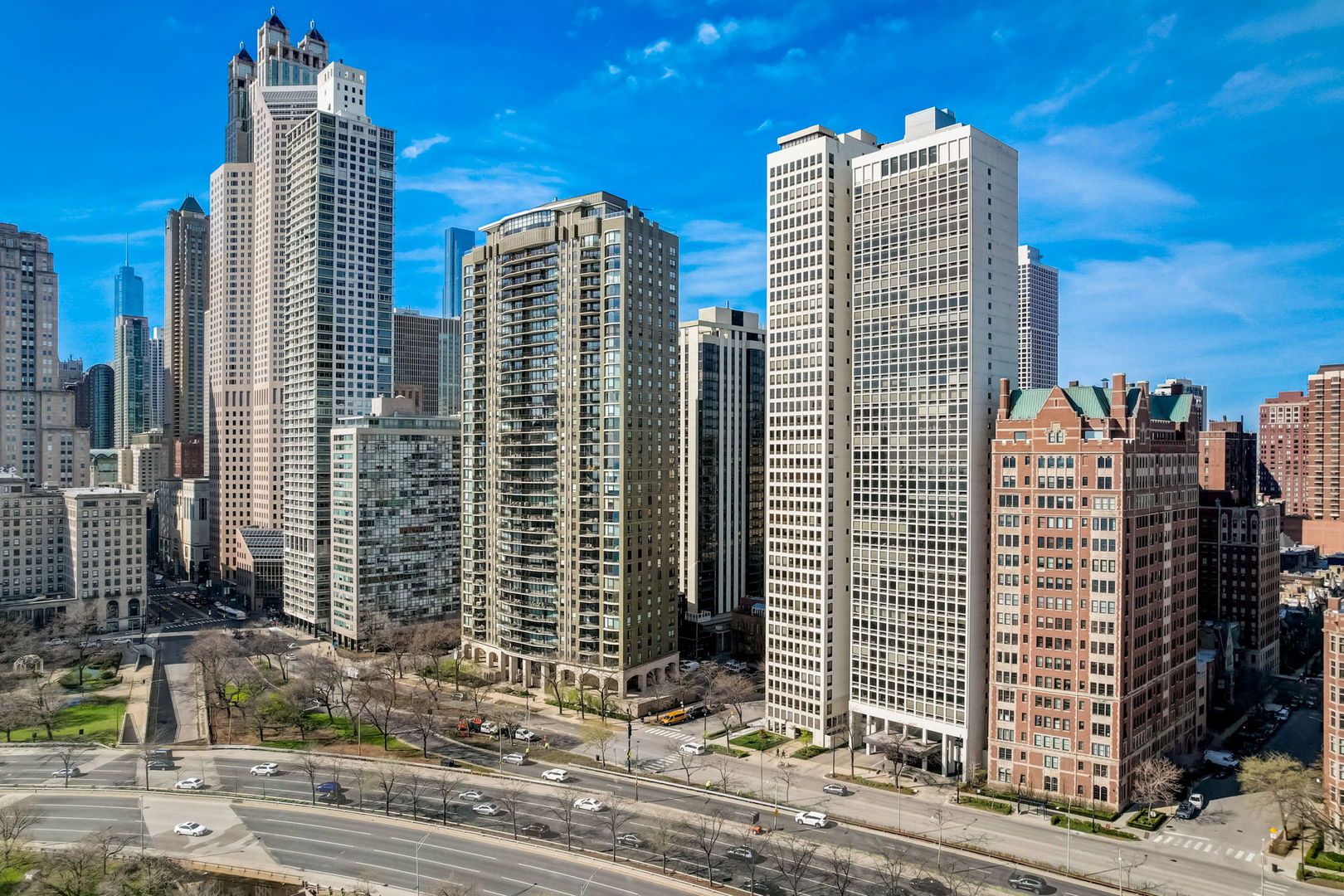 a view of a city with tall buildings