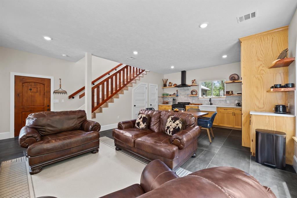 a living room with furniture and a couch