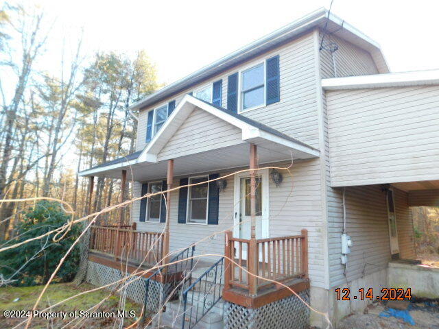 a front view of a house with balcony