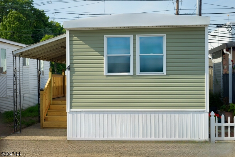 a front view of a house with a porch