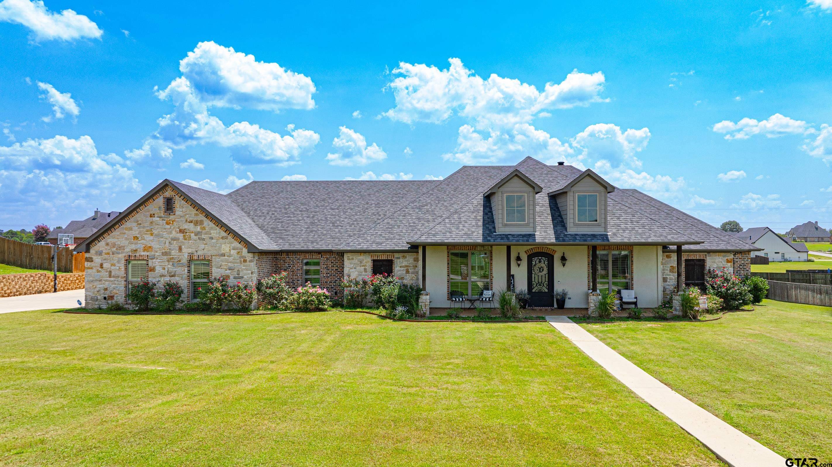 a front view of house with yard