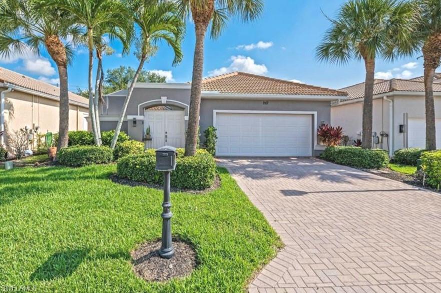 Front view, long paver driveway