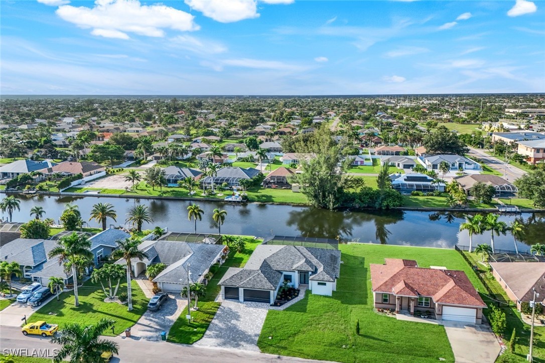 a view of a lake with a yard