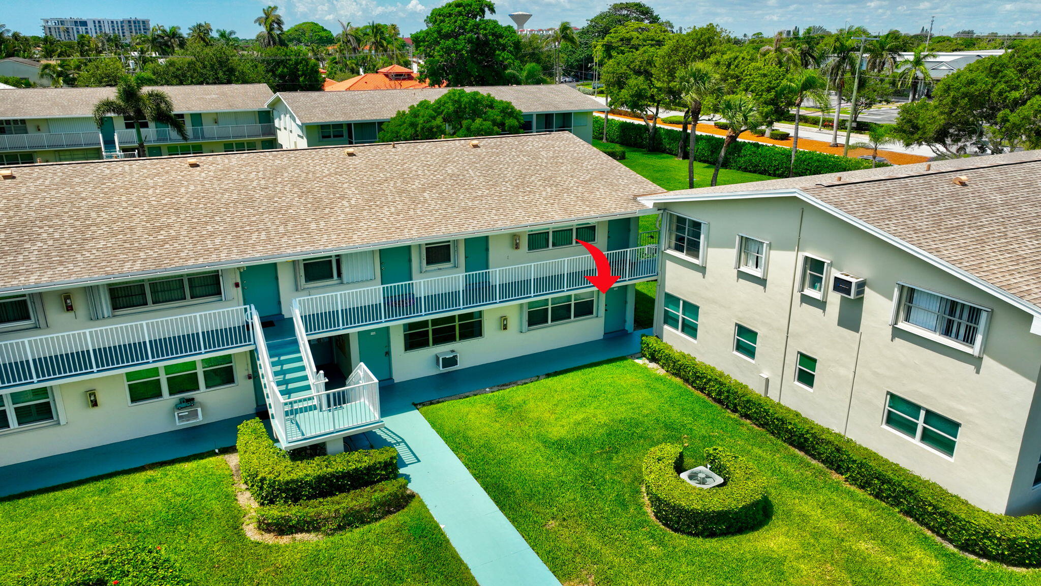 a aerial view of a house with a yard