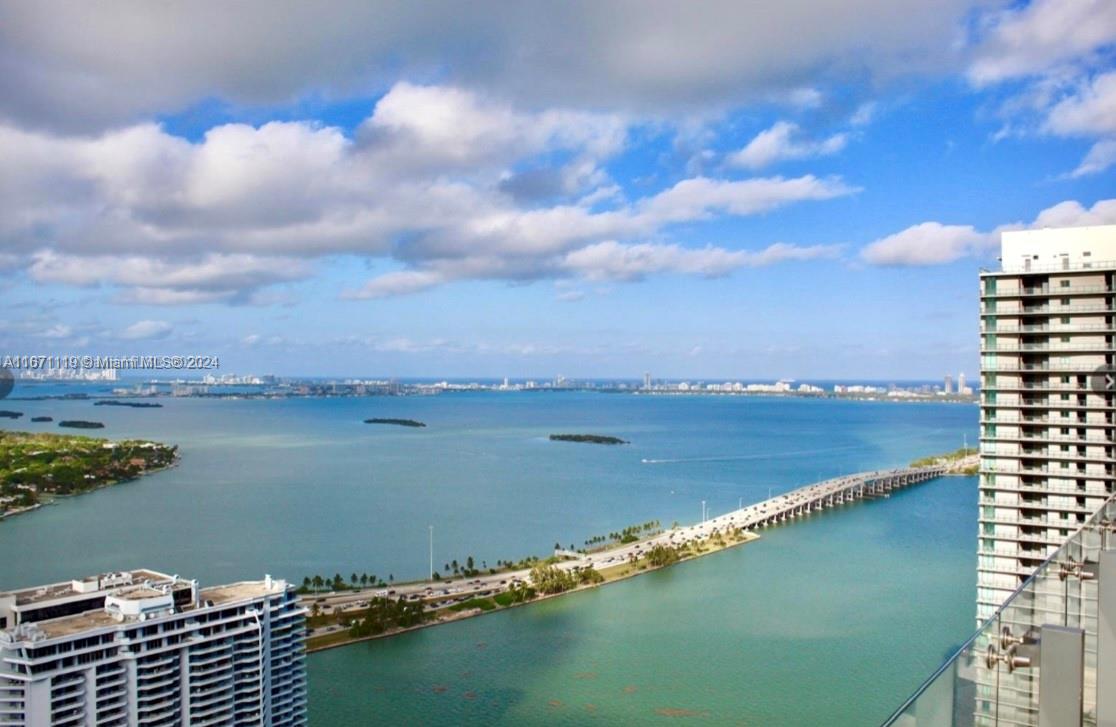 a view of a lake from a balcony