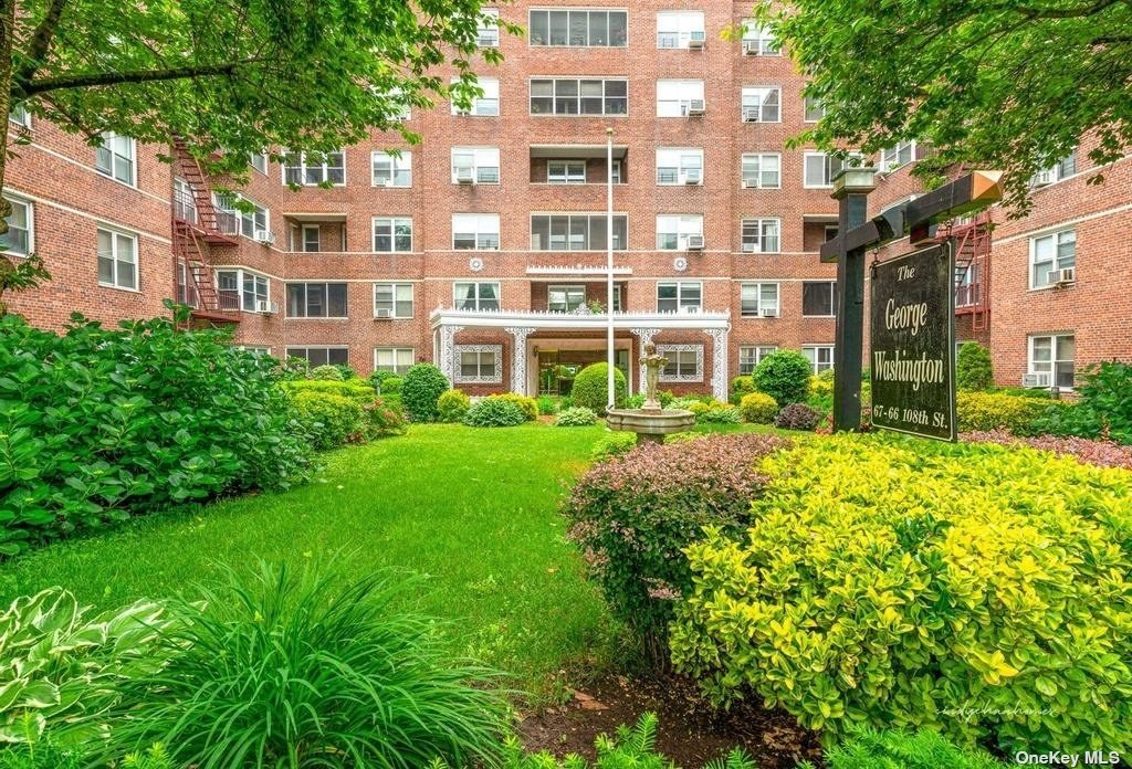 a view of a building with garden