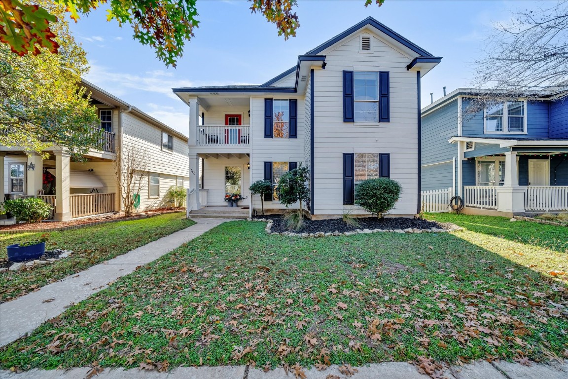 a view of a yard in front of house