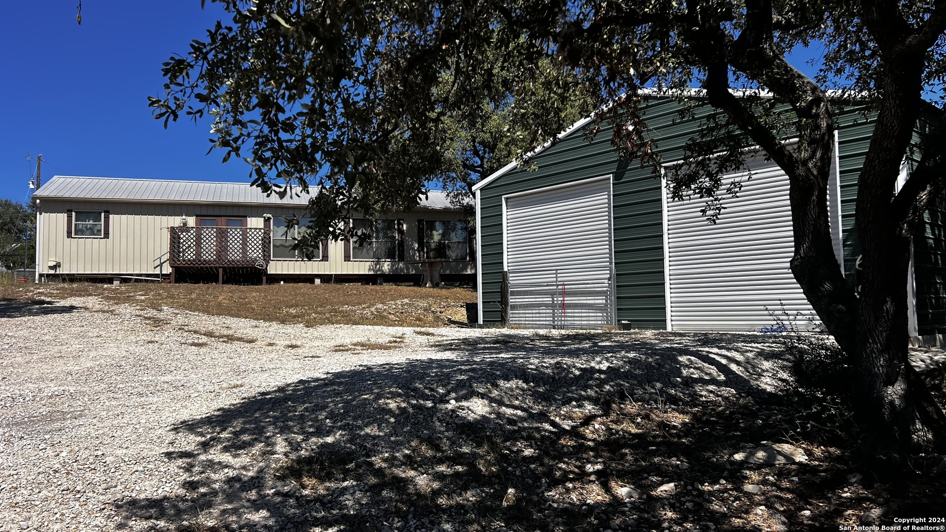 a house with a tree in front of it