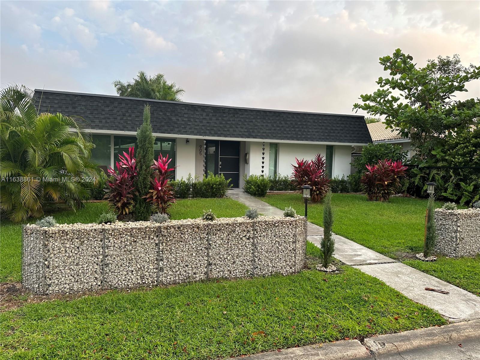 a front view of house with yard