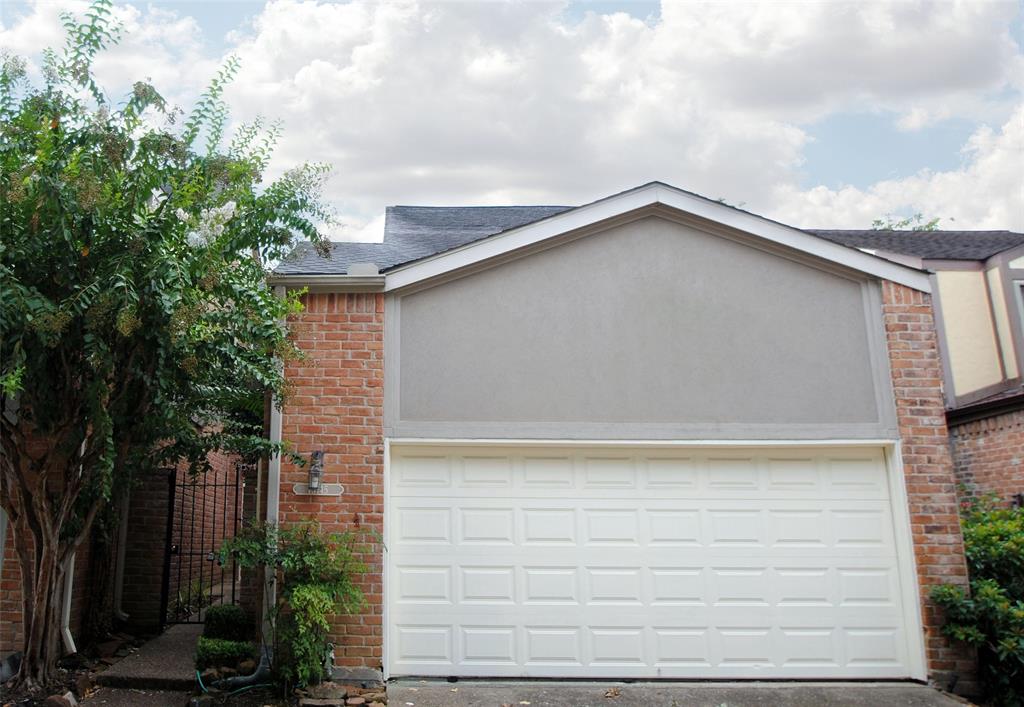 a close up of a house with a yard