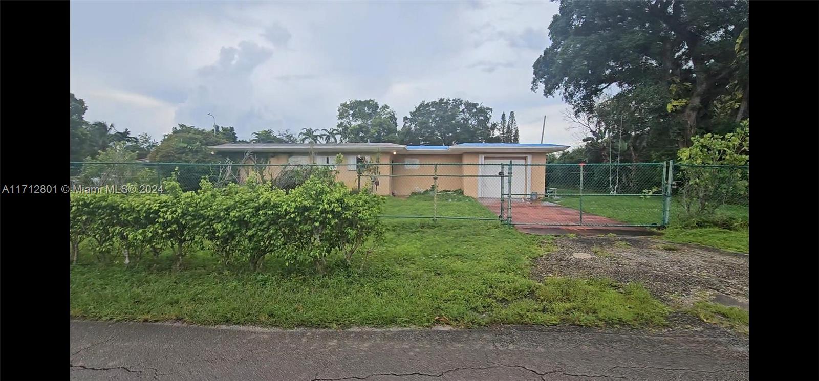 a view of backyard with green space