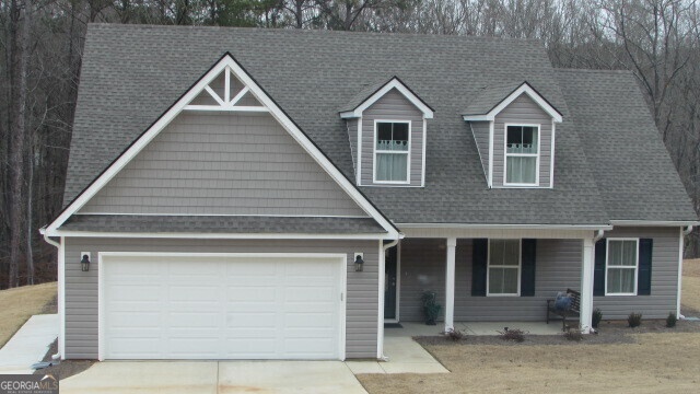 a front view of a house with yard