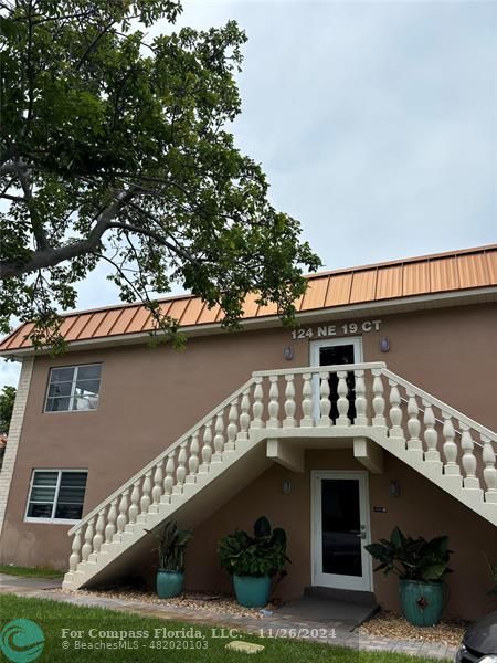 a view of a house with a balcony