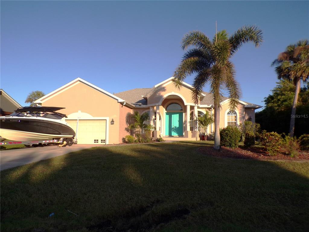 a view of a house with a street