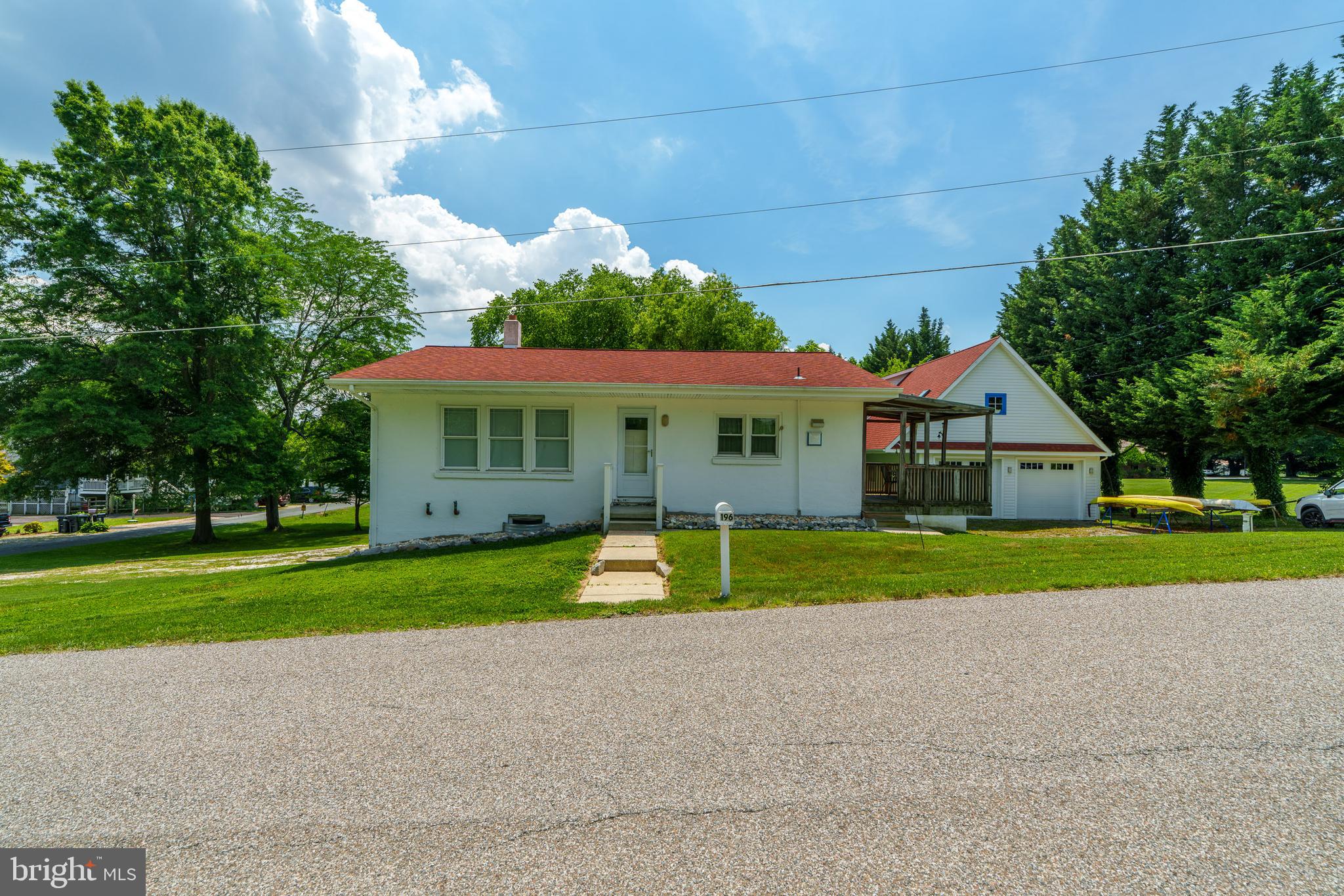 a view of house with outdoor space and front view of house