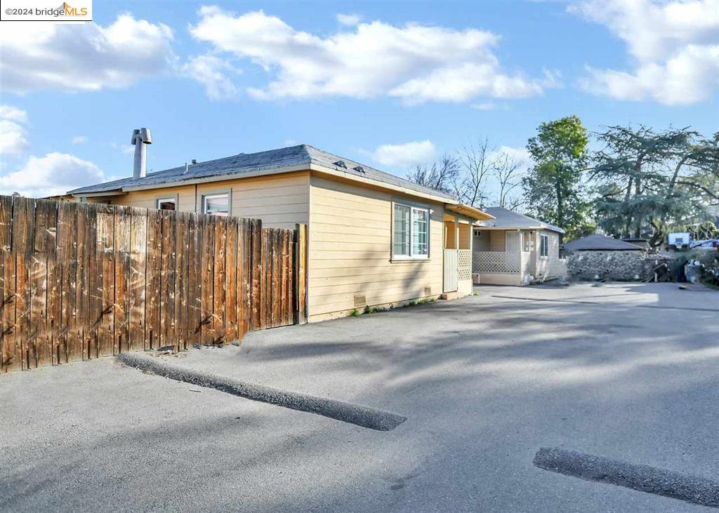 a front view of a house with a garage