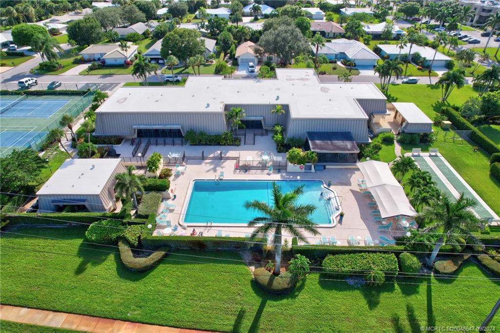 a aerial view of a house with garden