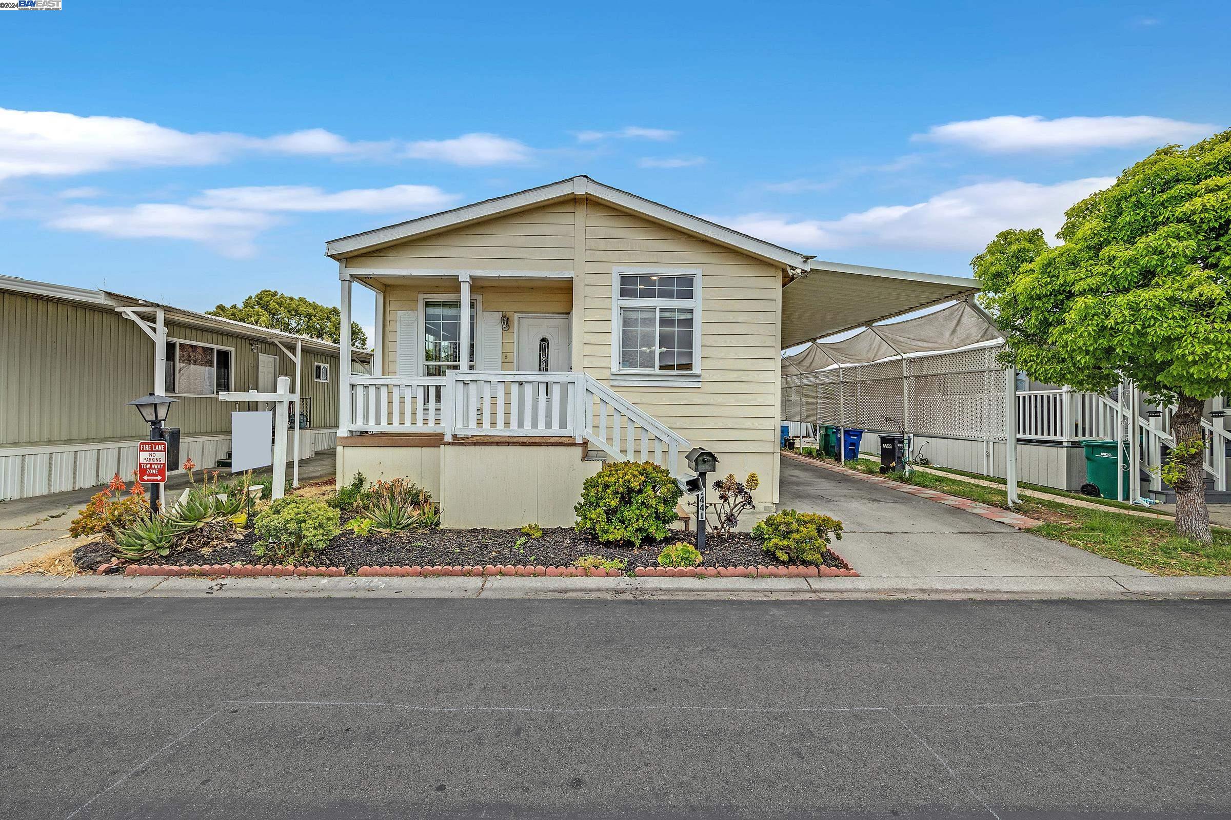 front view of a house with a small yard