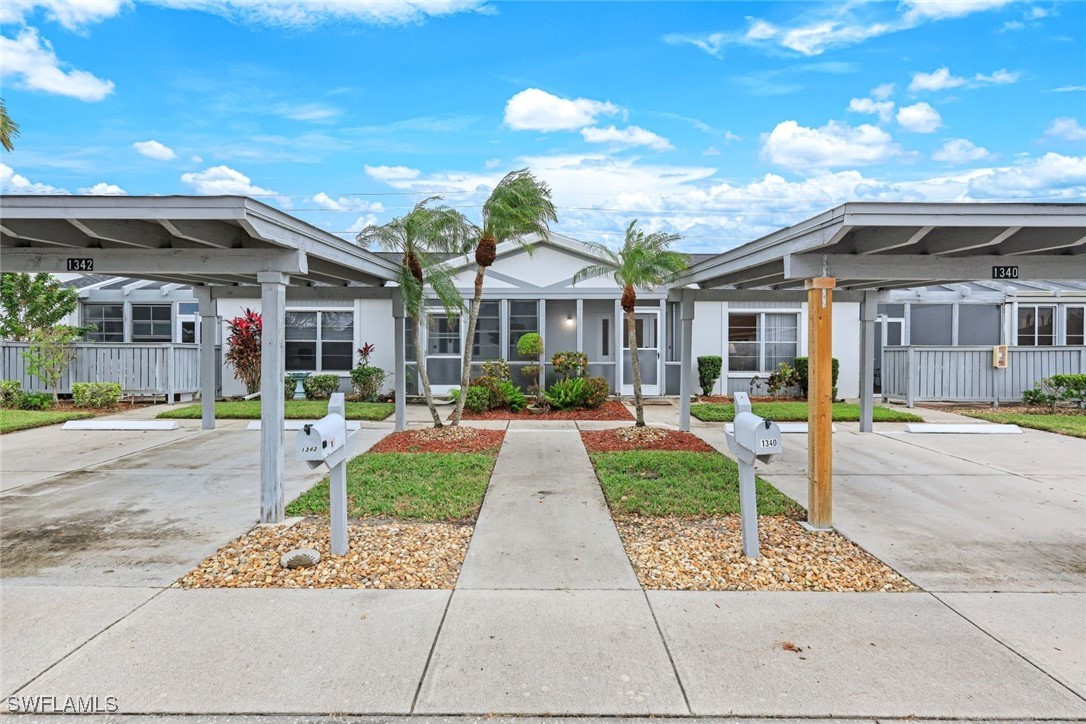 a front view of a building with garden