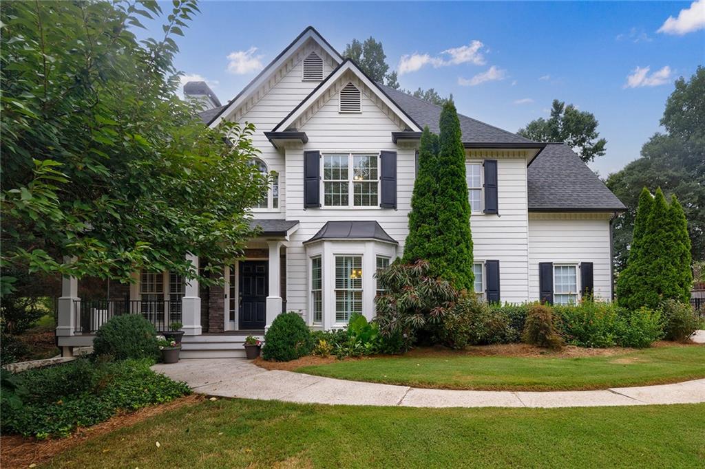 front view of a house with a yard