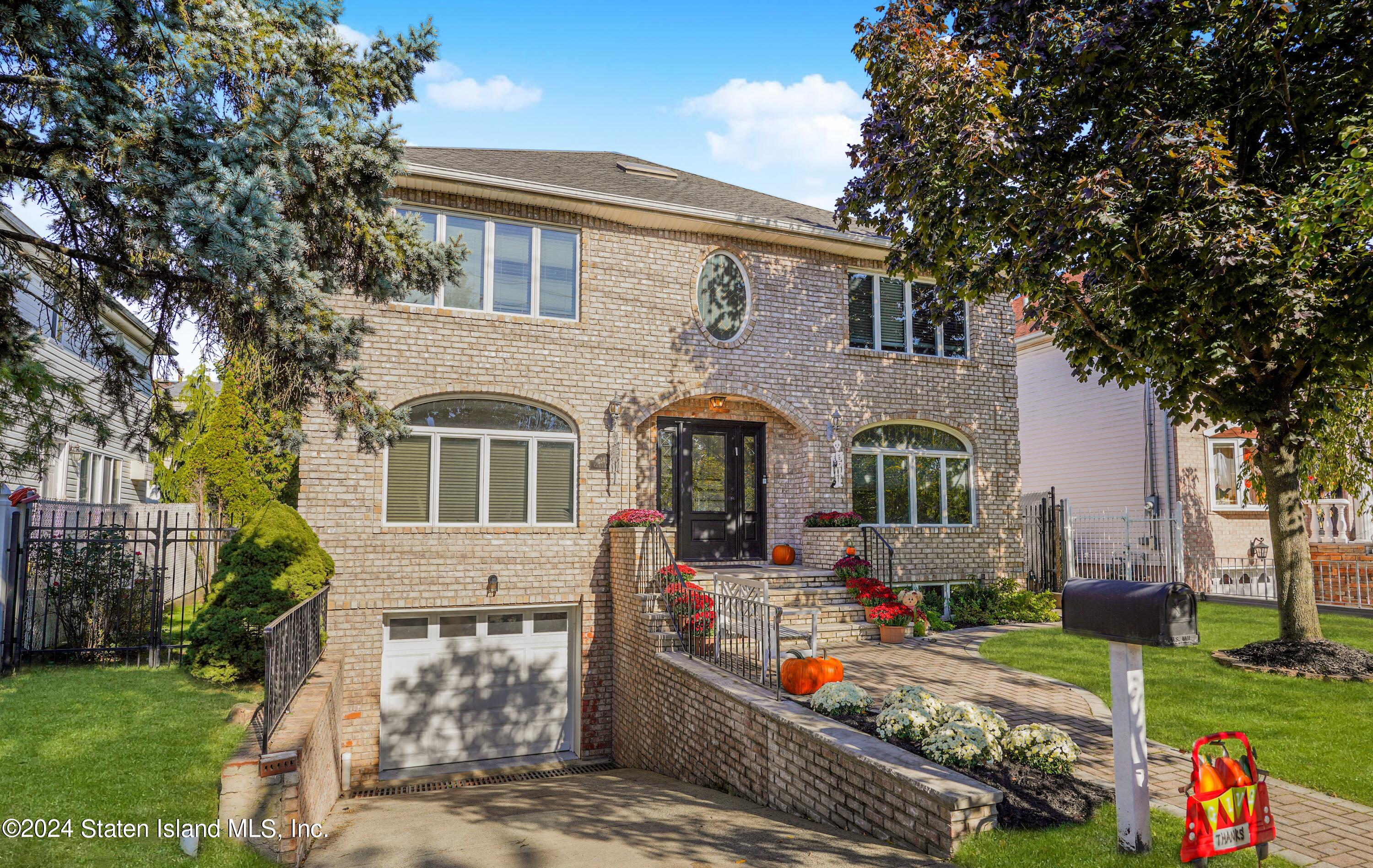 front view of house with a yard