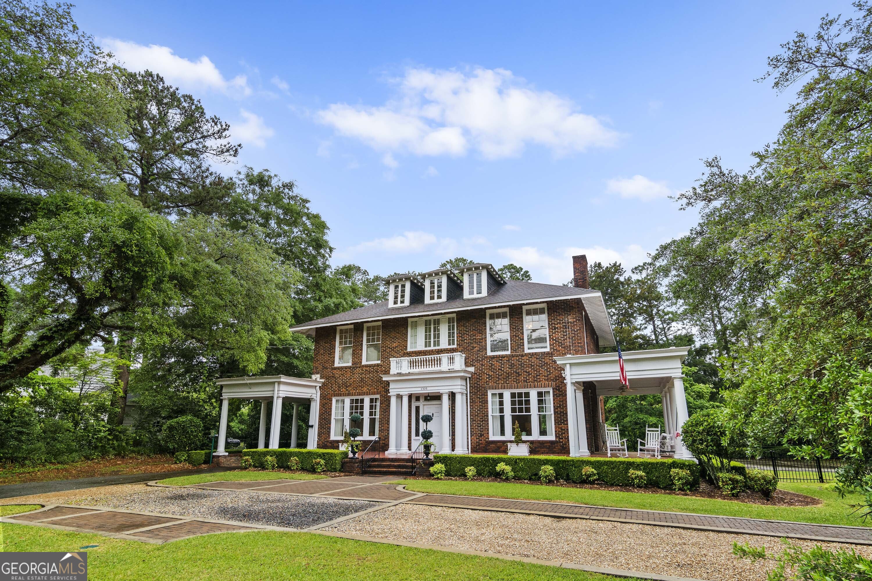 front view of residential houses with a yard