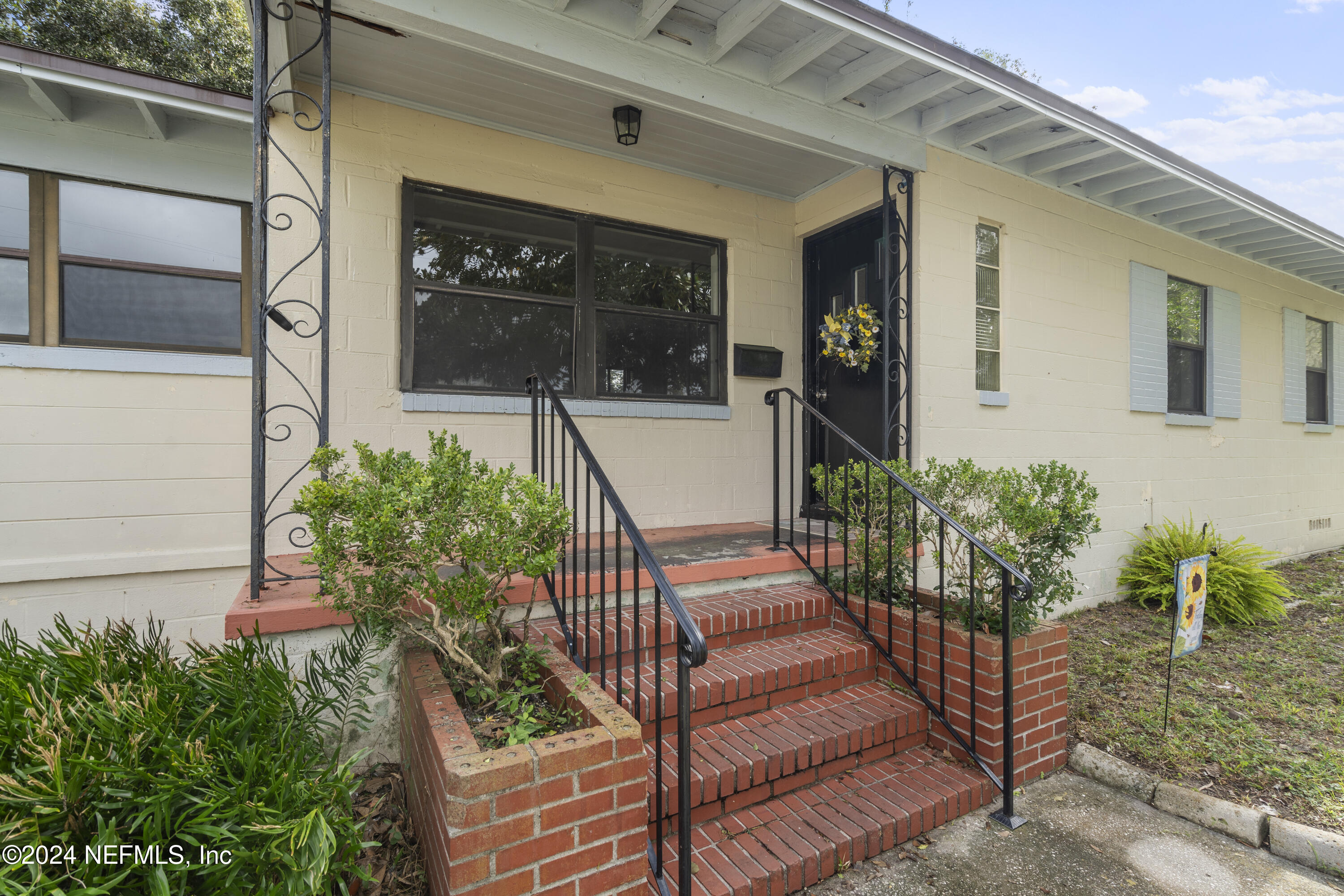 a view of a entryway door front of house