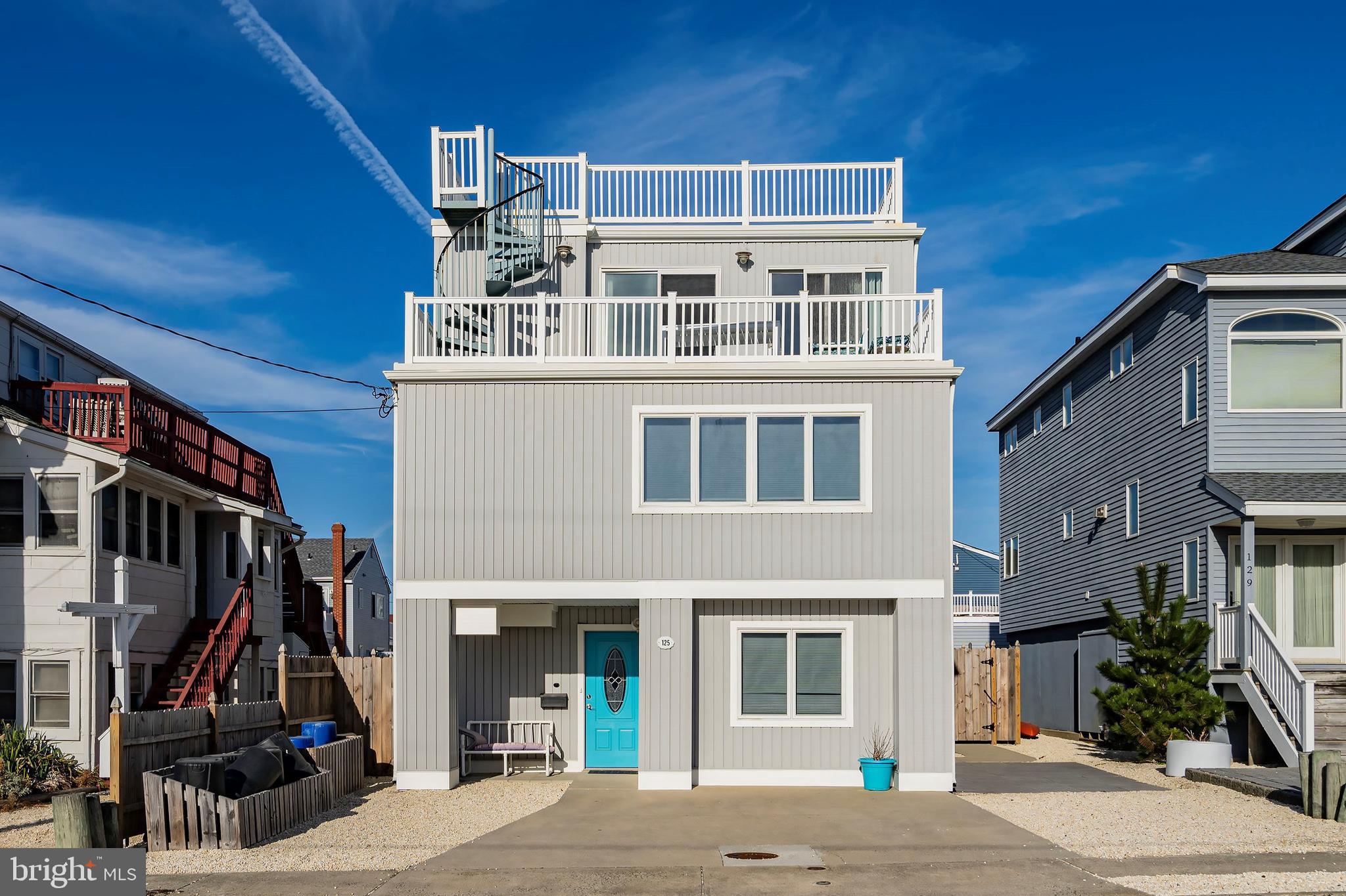 a front view of a building with street view