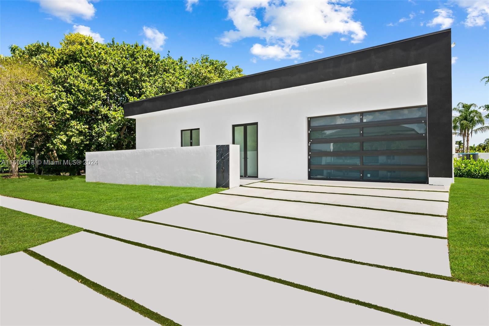 a house view with a garden space