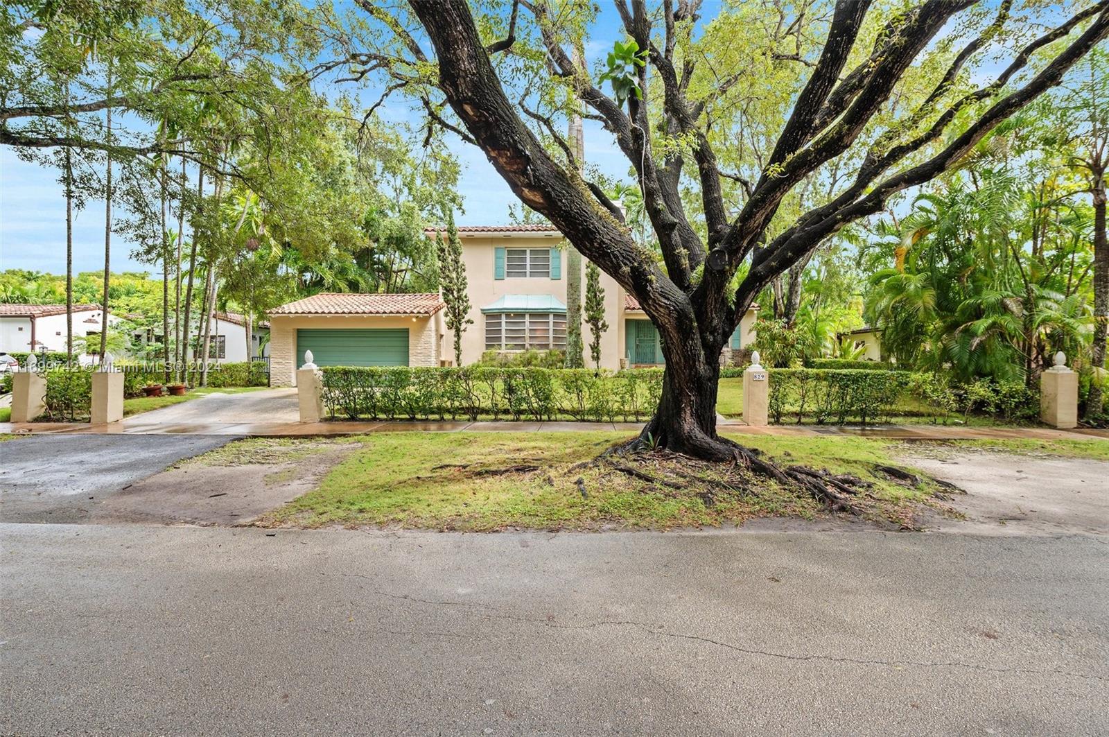 a house with trees in front of it