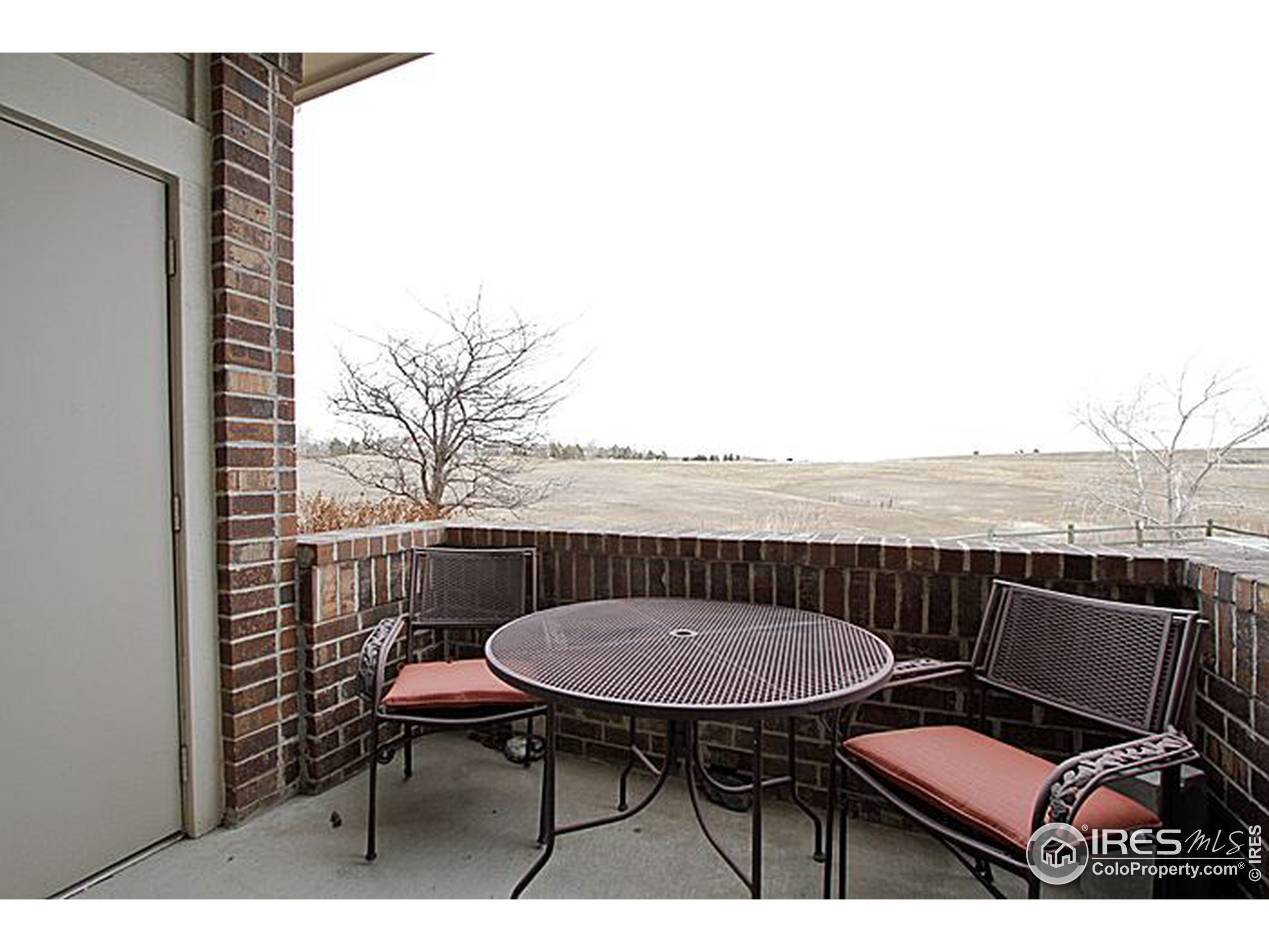 a view of a chairs in the roof deck