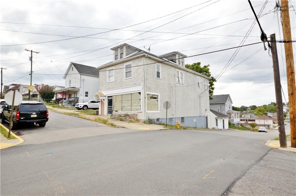 a view of a street in front of house