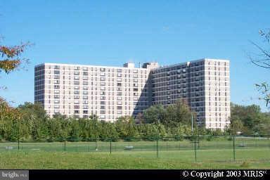 a view of a building with a yard