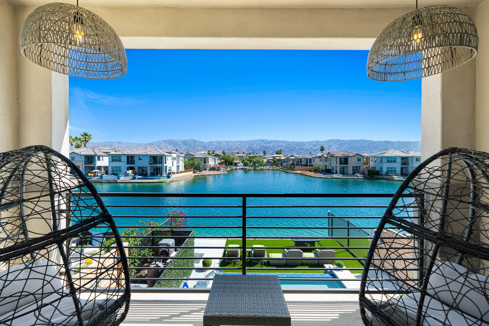 a view of a balcony with chairs