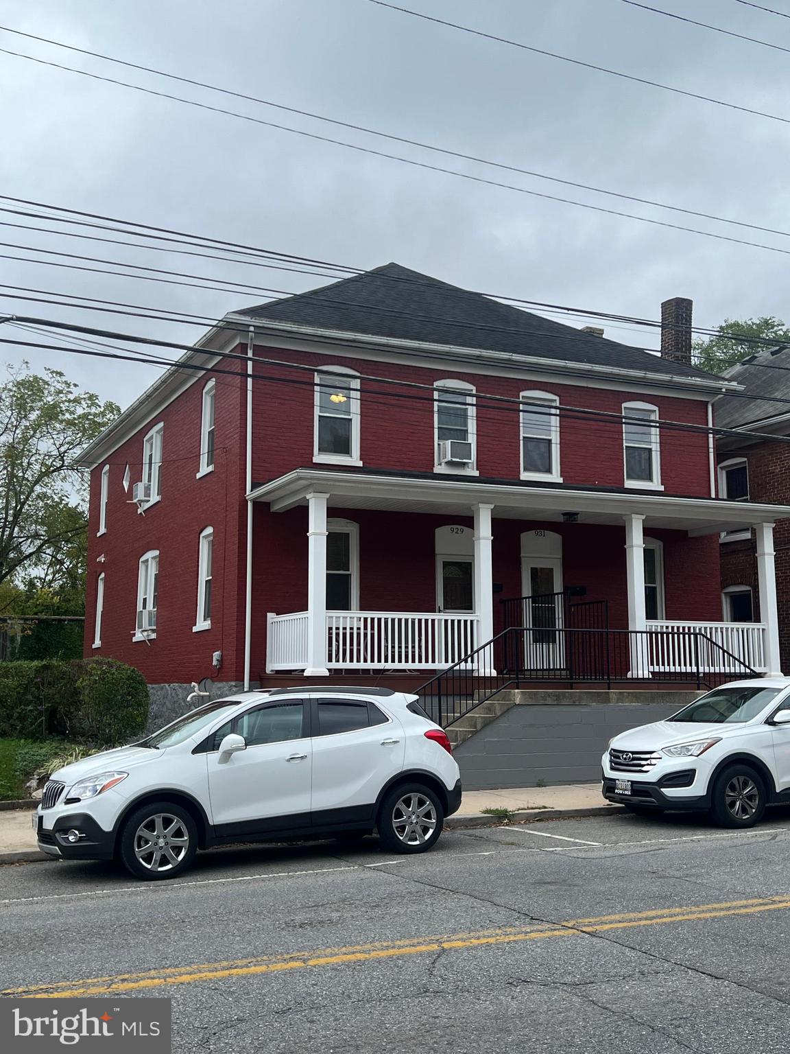 a car parked in front of a house