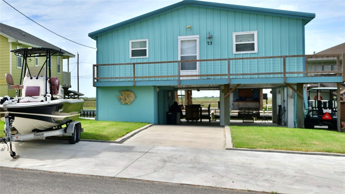 a view of a house with sitting area and furniture