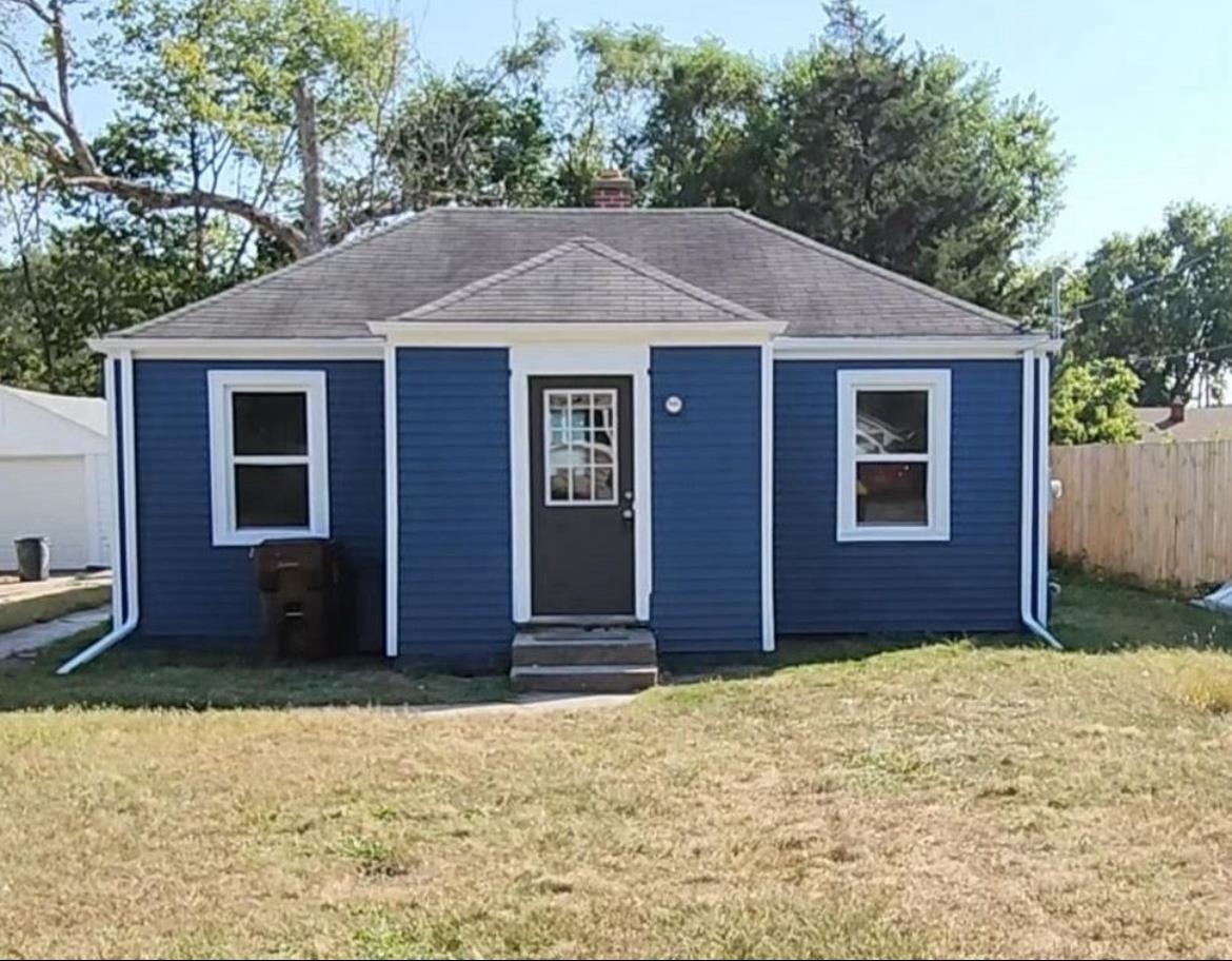 a front view of house with yard