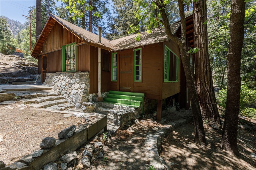 front view of a house with a yard