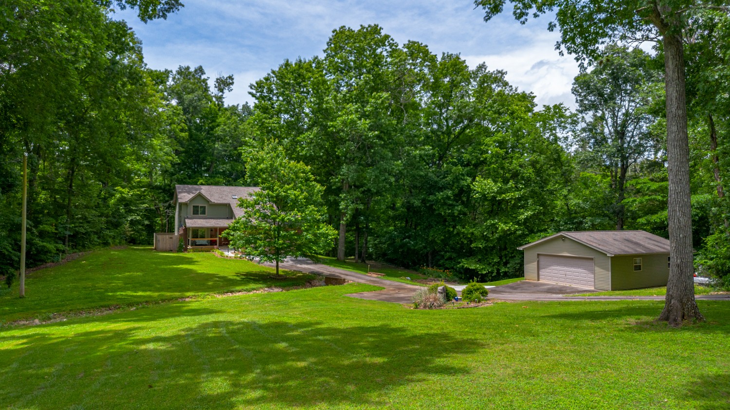 a view of a backyard with a garden