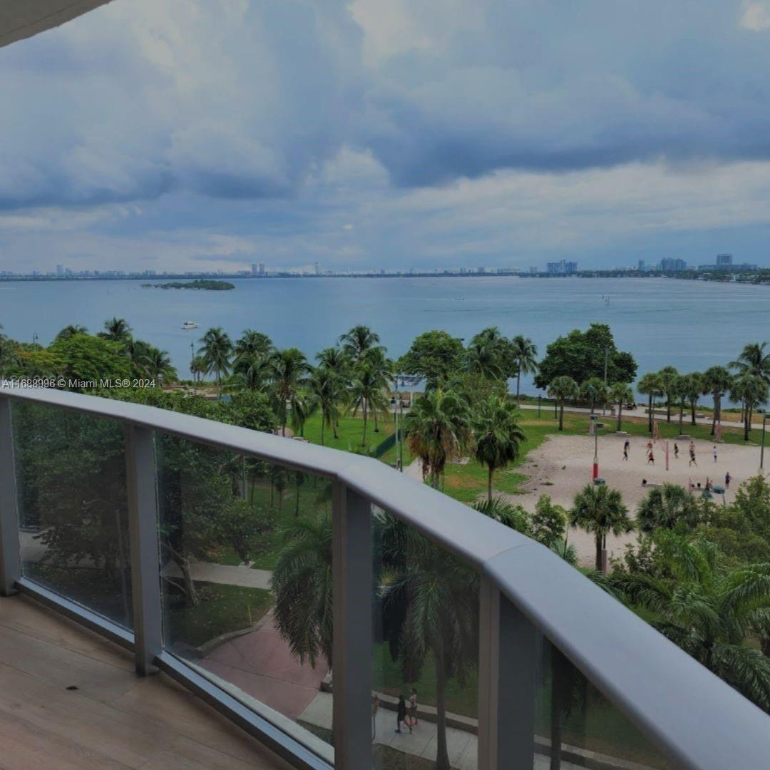 a balcony with an outdoor space