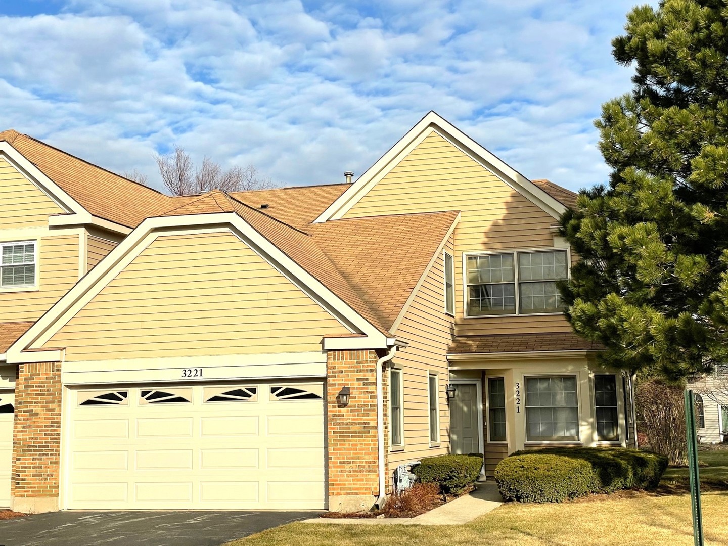 a view of a house with a street