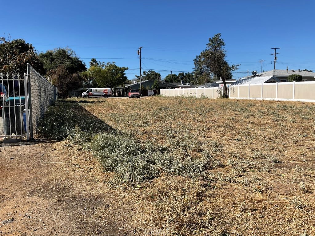 a view of a backyard of the house